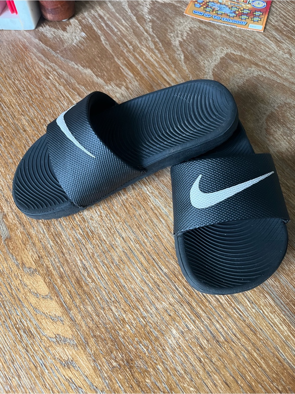 Nike kids Black Slide Sandals with White Swoosh